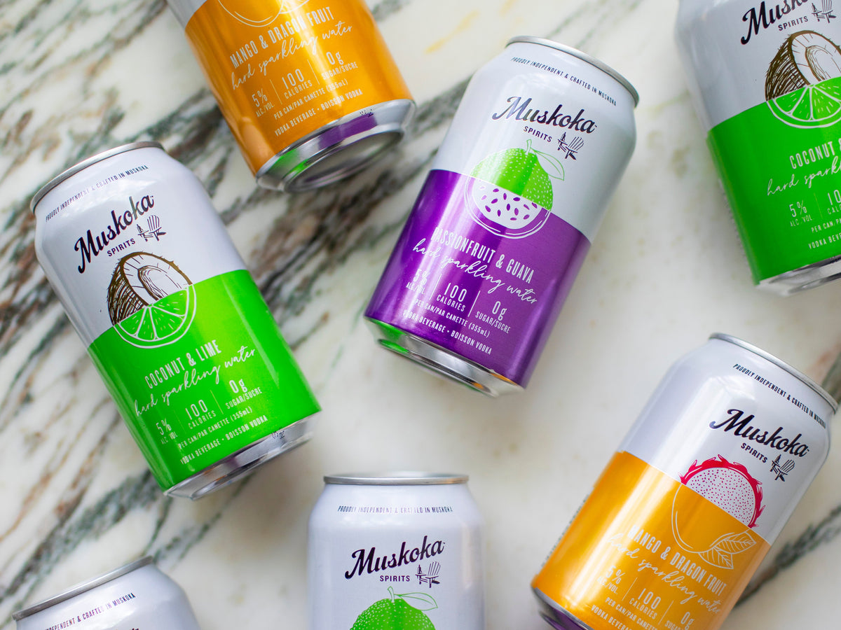 Hard Sparkling Water cans friends cheers